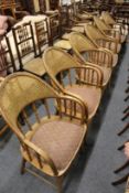 A set of six ash hoop back armchairs.