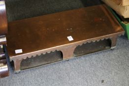 A copper warming tray.
