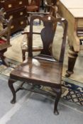 An 18th / 19th century oak and pine solid seat side chair.