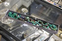 A group of chunky bead necklaces.