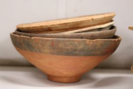 Four Chinese terracotta bowls.