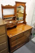 A Victorian walnut dressing chest.