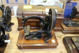 A Willcox and Gibb's sewing machine.