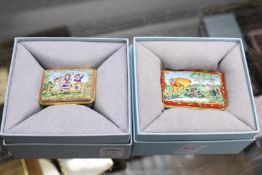 Two Halcyon Days rectangular enamel boxes, one depicting Winnie the Pooh.