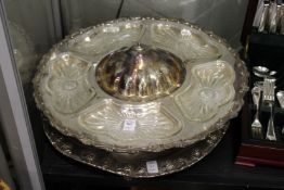 A plated centrepiece and a carving dish.