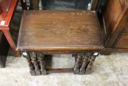 A nest of tables and a three tier table.