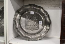 An armorial pewter dish.