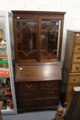 An Edwardian mahogany bureau bookcase.