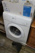 A White Knignt washing machine.