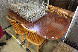A mahogany pedestal dining table.