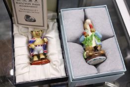 A Halcyon Days enamel box modelled as Peter Rabbit together with a Halcyon Days model of an