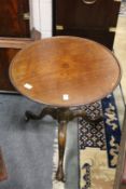 A 19th century mahogany tripod table.