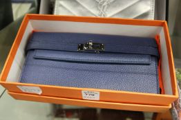 A ladies' leather purse, boxed.
