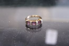 A 9ct gold diamond and amethyst ring.