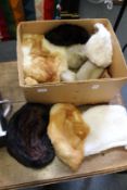 Various fur hats.