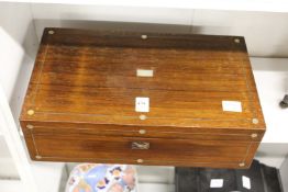 A Victorian rosewood writing slope.