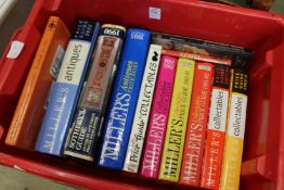 A box of art reference books.