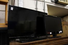 Two small flat screen TV's.