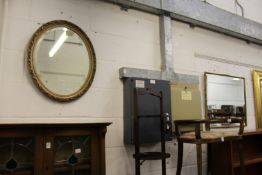 Two gilt framed mirrors.