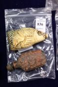 Two Chinese snuff bottles, one modelled as a fish head.
