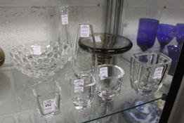 A small group group of Orrefors glassware to include small vases with engraved decoration.