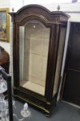 A good large French Empire rosewood and brass inlaid standing display cabinet with pineapple finials