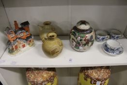 A Staffordshire house, two unusual stoneware pots, a ginger jar and cover and Meissen cups and a