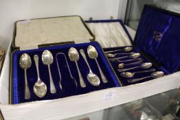 Two cased sets of silver coffee spoons together with other cased flat ware.