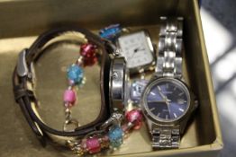A Fossil wristwatch, a ladies' Sekonda wristwatch and a ladies' watch with decorative bracelet.