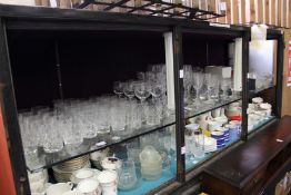 A large quantity of household glassware.
