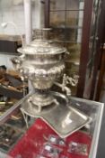 A samovar and stand.