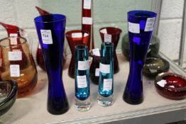 A pair of Whitefriars blue vases and a pair of kingfisher blue chimney vases.