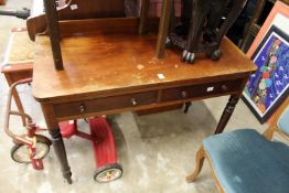 A Victorian mahogany two drawer side table.