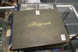 Two old photograph albums.