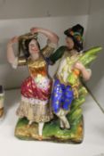 A pottery group of a Turkish man and woman dancing.