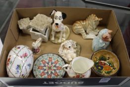 A group of collectable items to include two Royal Doulton models from 101 Dalmatians, a Russian