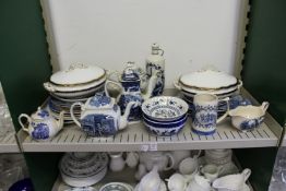 A shelf of blue and white china.