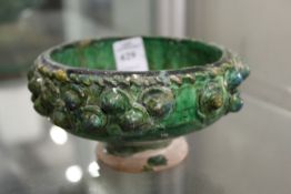 A good Kashan moulded green glazed pottery bowl.
