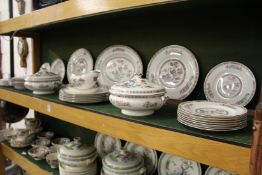 A Wedgwood Kutani Crane eight place dinner service.