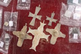 A box of old bronze crucifixes.