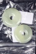 Two Chinese jade roundels.