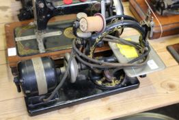 An unusual Willcox and Gibb's electrically operated small sewing machine.