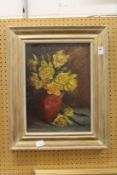 A M Langdale, a still life of flowers in a vase, oil on board.