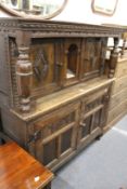 A good reproduction oak court cupboard.