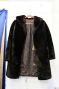 A ladies' fur coat.