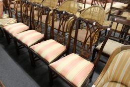 A set of four Georgian style mahogany dining chairs.