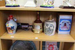 The Grey Beard Heather Dew whisky bottle and other related items.