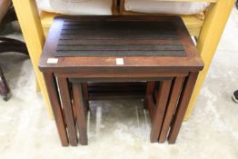 A nest of hardwood tables.