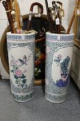 Two Chinese pottery stick stands.