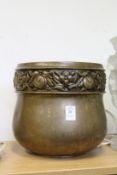 An Art Nouveau style copper jardiniere.